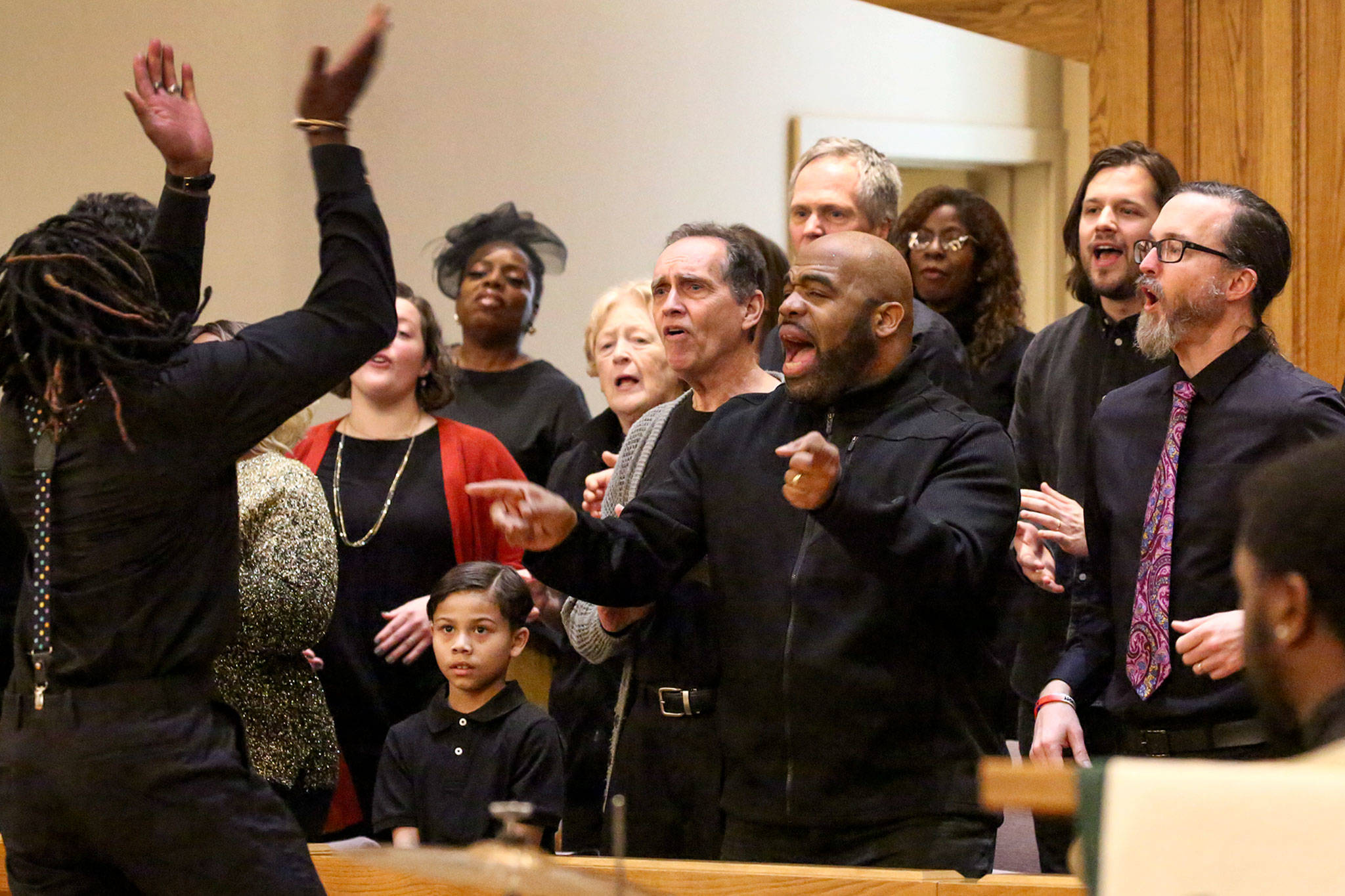 The MLK Jr. Celebration Choir sings at the start of the Martin Luther King Jr. celebration Sunday afternoon at First Presbyterian Church in Everett. (Kevin Clark / The Herald)