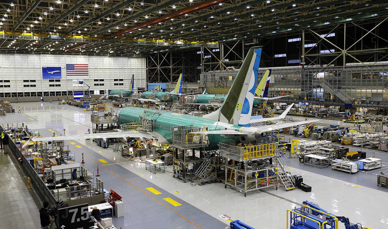 This 2015 photo shows a Boeing 737 Max airplane being built on the assembly line in Renton. (AP Photo/Ted S. Warren, File)
