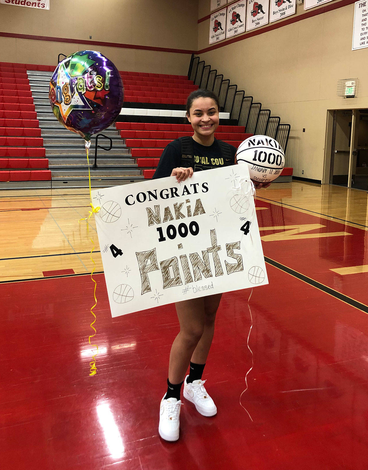 Lynnwood’s Nakia Boston poses after surpassing 1,000 career points in a game against Snohomish on Friday evening. (Photo provided by Brandon Newby)