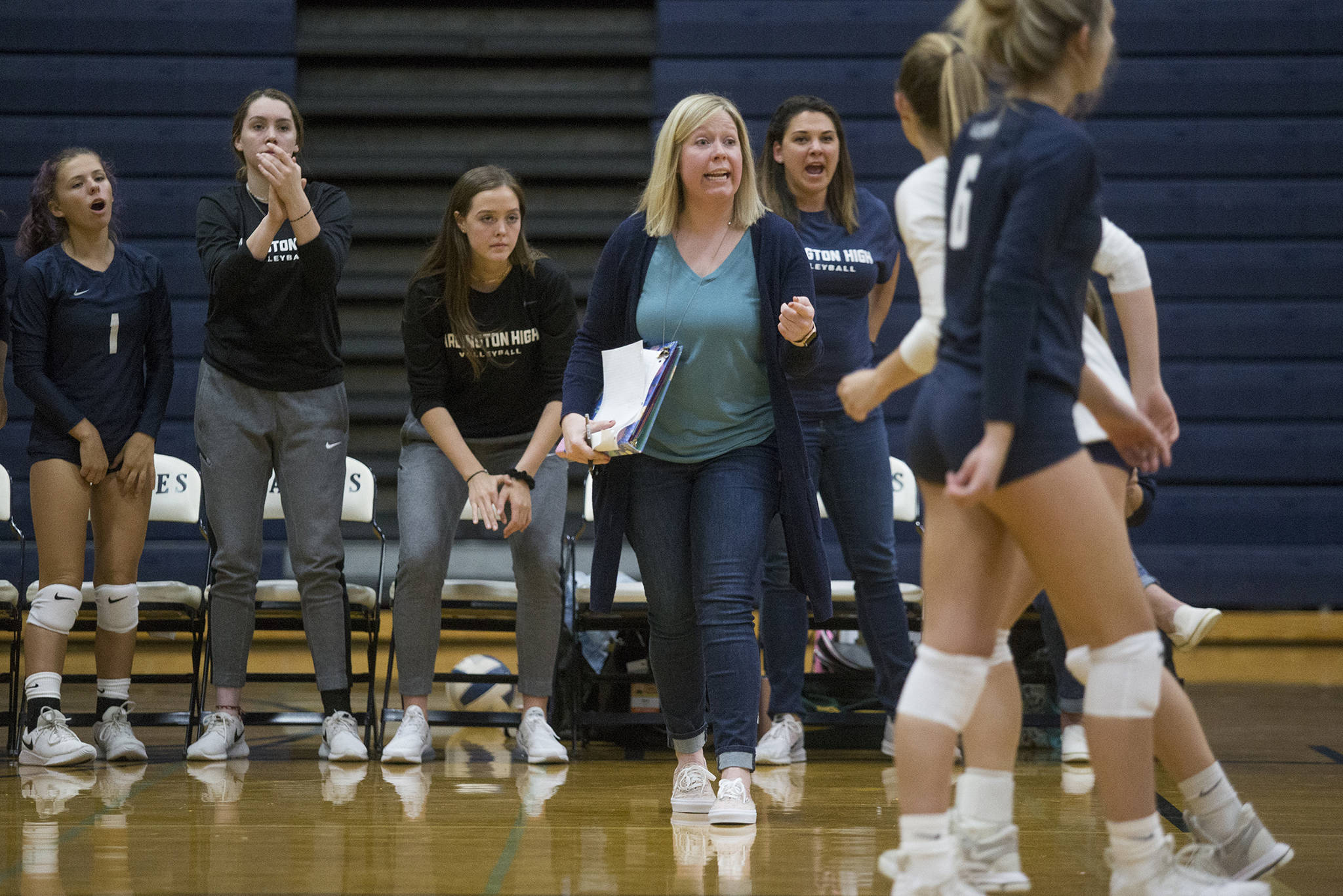 Arlington volleyball coach Whitney Williams directs the Eagles during a match against Shorecrest on Sept. 17, 2019 in Arlington. Williams was hired as the new volleyball coach at Everett Community College. (Andy Bronson / The Herald)