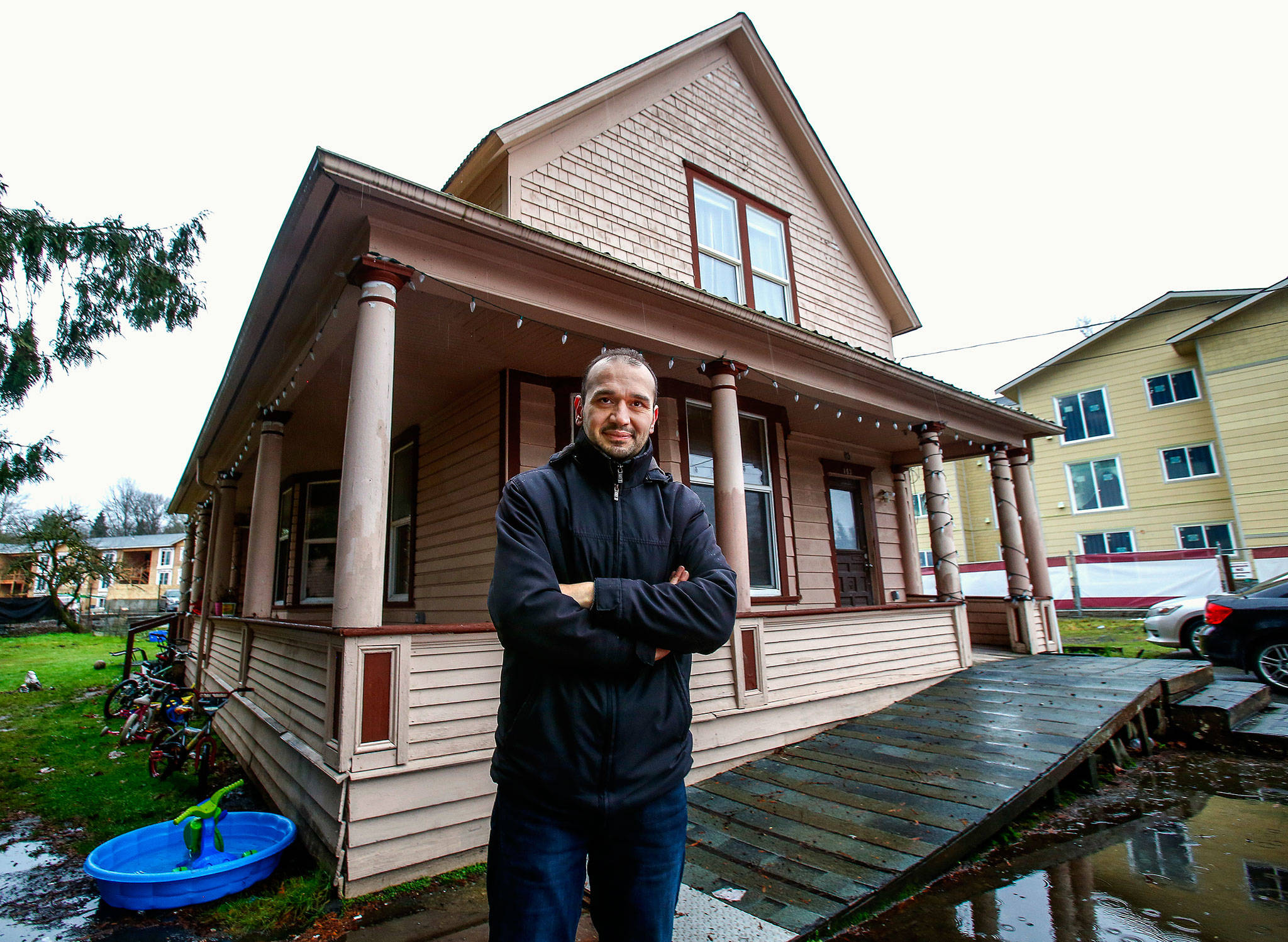 Emanuel Popa owns two adjacent 1903 houses on South Ann Street. The original Monroe homes of the family that ran Buck’s Shingle Mill, they may be demolished to make way for apartments. Popa is willing to give them away to anyone who wants to pay to move them. (Dan Bates / The Herald)