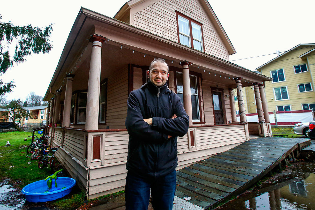 Emanuel Popa owns two adjacent 1903 houses on South Ann Street. The original Monroe homes of the family that ran Buck’s Shingle Mill, they may be demolished to make way for apartments. Popa is willing to give them away to anyone who wants to pay to move them. (Dan Bates / The Herald)