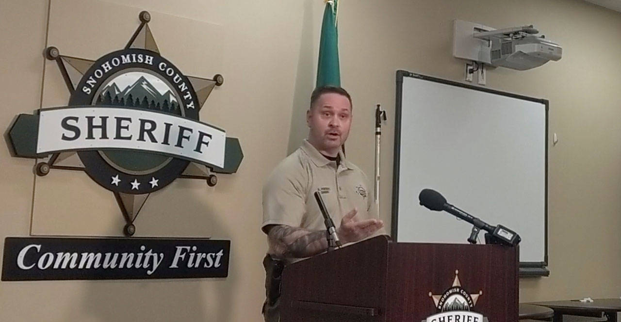 Snohomish County Sheriff Adam Fortney speaks to the press Tuesday about his decision to rehire Deputy Art Wallin. (Zachariah Bryan / The Herald)