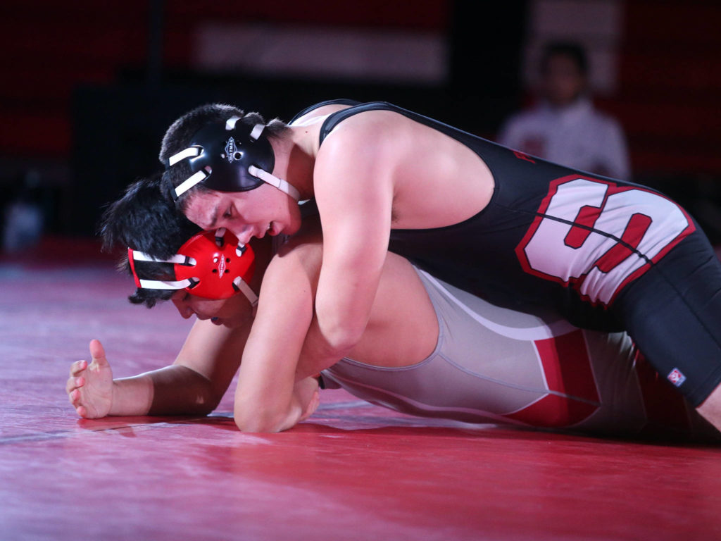 Snohomish’s Karson Castillo, top, keeps Anthony Fitzgibbon on the mat as Snohomish lost to Stanwood 41-39 in a boys’ wrestling meet on Tuesday, Jan. 28, 2020 in Snohomish, Wash. (Andy Bronson / The Herald)
