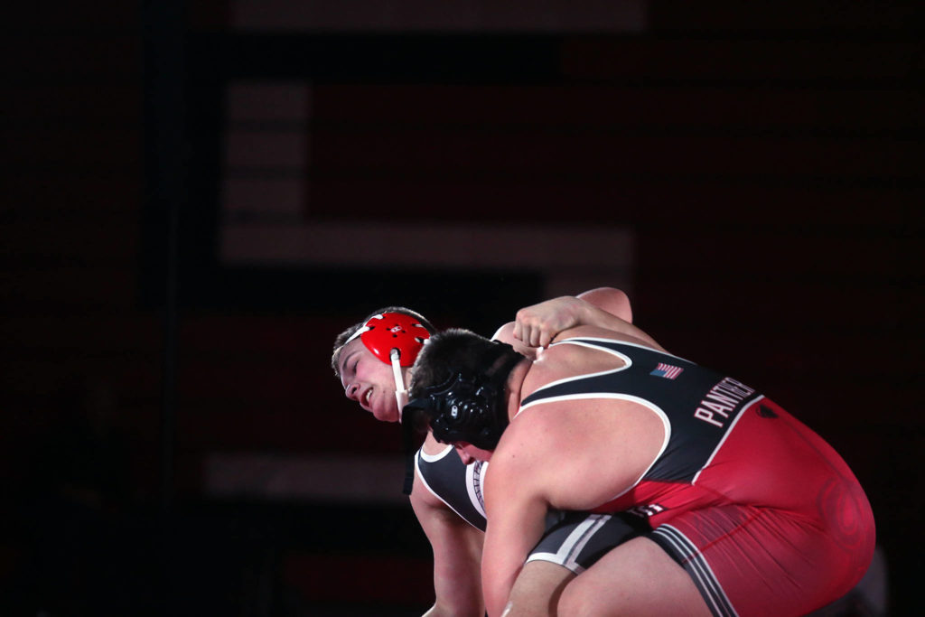 Stanwood’s Jackson Houston tries to pull Snohomish’s Angelo Leyde to the mat as Snohomish lost to Stanwood 41-39 in a boys’ wrestling meet on Tuesday, Jan. 28, 2020 in Snohomish, Wash. (Andy Bronson / The Herald)

