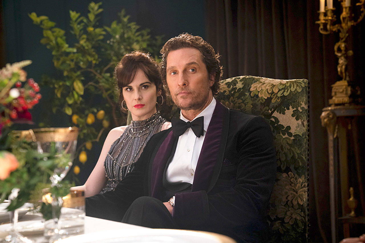 Matthew McConaughey plays an American weed kingpin in London, and Michelle Dockery of “Downton Abbey” fame is his wife, in “The Gentlemen.” (STX Films)