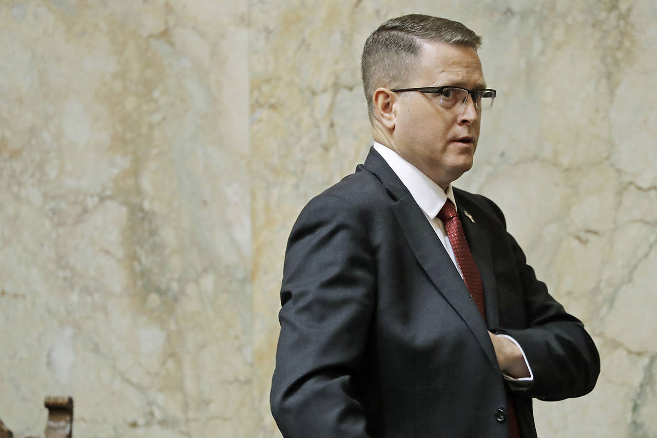 Rep. Matt Shea leaves the House floor Jan. 13, following the first day of the 2020 session of the Washington legislature at the Capitol in Olympia. (AP Photo/Ted S. Warren)