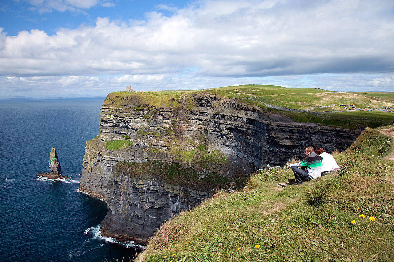 For cheaper entry and a more peaceful experience, visit the Cliffs of Moher early or late in the day. (Rick Steves’ Europe)