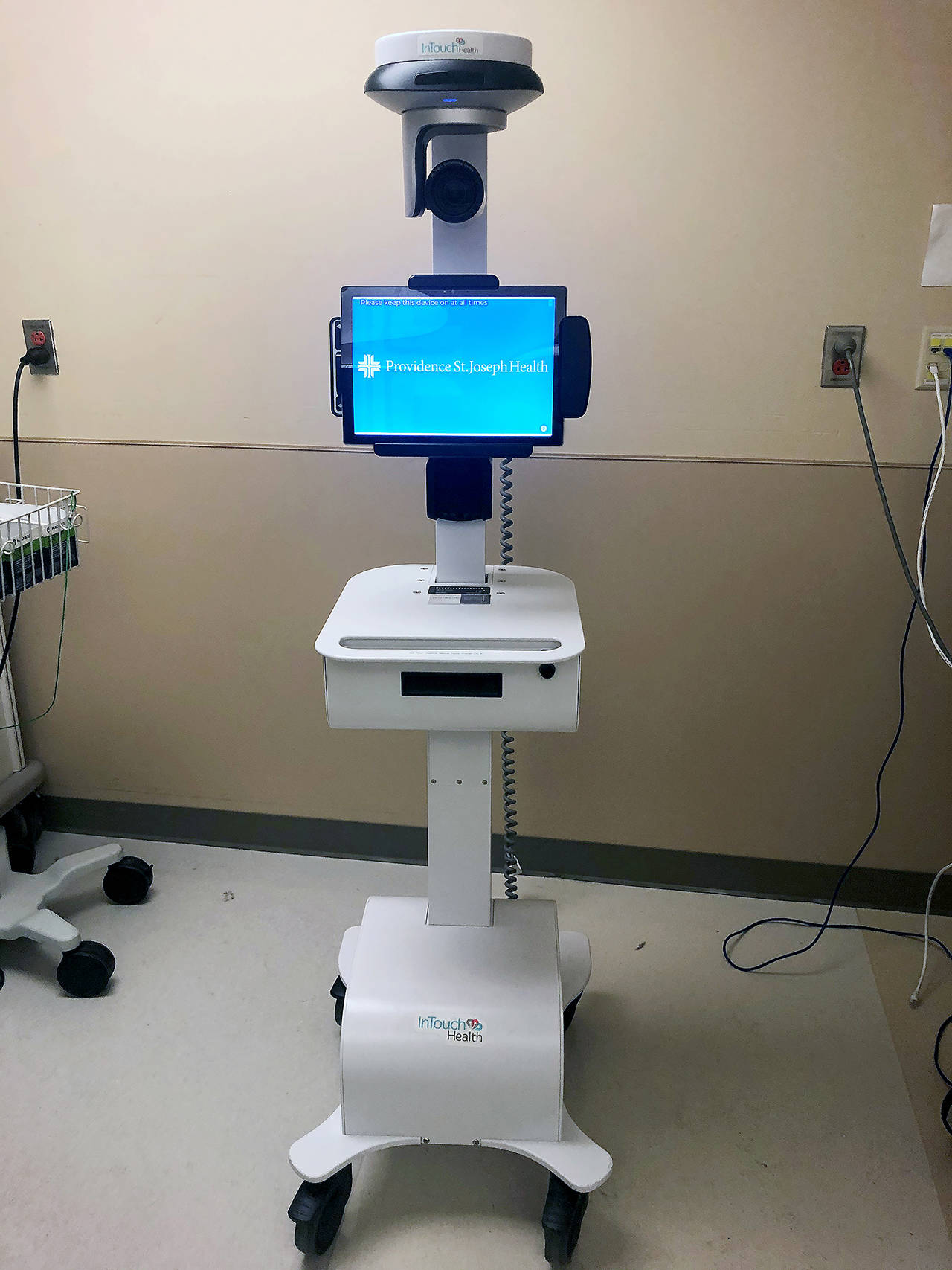 A robot helps treat the Snohomish County man in his 30s with coronavirus who since Monday has been in an isolated room at Providence Regional Medical Center Everett. Not shown is the robot’s stethoscope and microphone so the patient can talk with the doctor, who stays out of the room. (Providence Regional Medical Center)