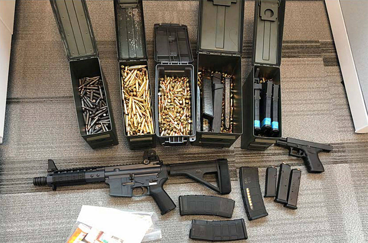Federal agents seized guns and ammo from a man living in Tulalip in 2017. He was sentenced to prison Monday for smuggling firearms in the mail, postmarked to Sweden. (Courtesy of the U.S. Attorney’s Office in Seattle)