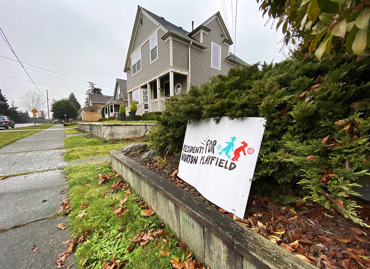 Neighbors near the Everett School District field along Norton Avenue rallied to protect it from development. (Sue Misao / Herald file)