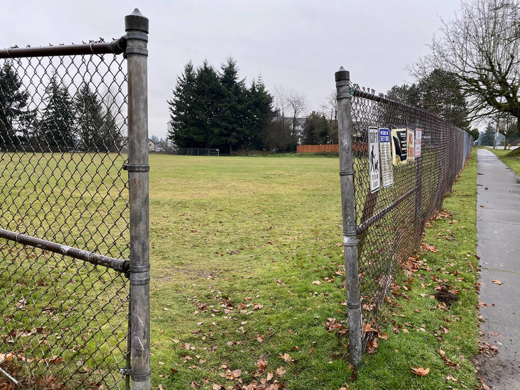 The open field on Norton Avenue was the site of a proposed housing development for students and their families who are experiencing homelessness. (Sue Misao / Herald file)
