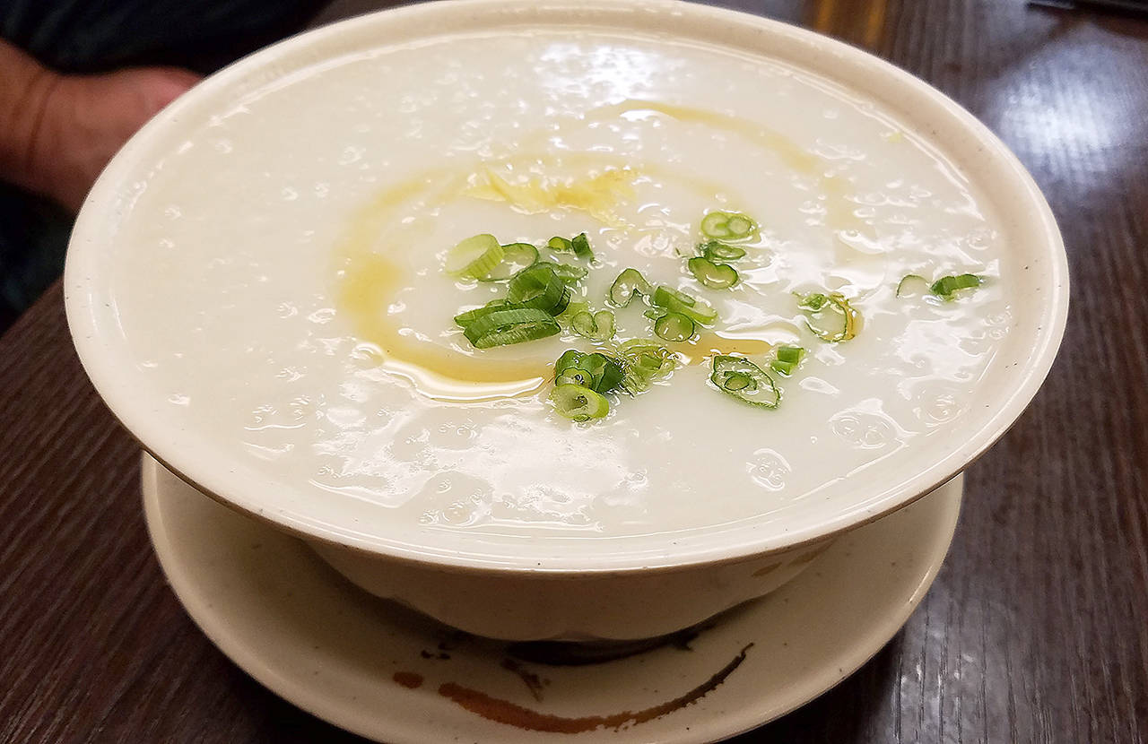 Wonton Noodle House serves congee, a rice-based soup, with many different variations. This one had pumpkin, rock cod and ginger. (Sharon Salyer)
