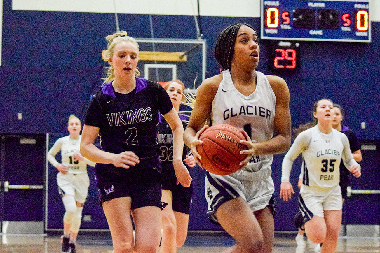 Glacier Peak’s Aaliyah Collins attempts a layup against Lake Stevens on Tuesday, Jan. 28 at Glacier Peak High School in Snohomish. (Katie Webber / The Herald)