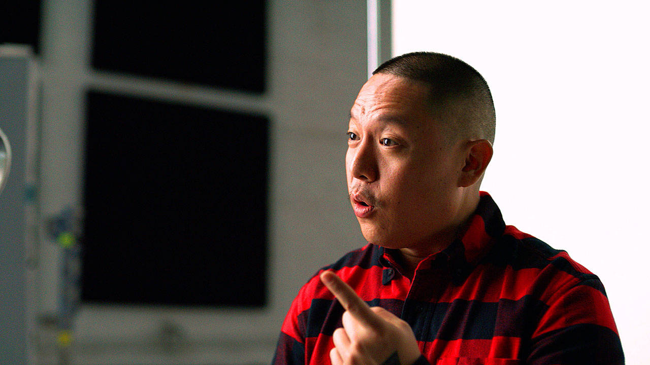 Chef Eddie Huang is seen in New York filming a video for a campaign challenging Merriam-Webster’s dictionary entry of “Chinese restaurant syndrome.” (Associated Press)