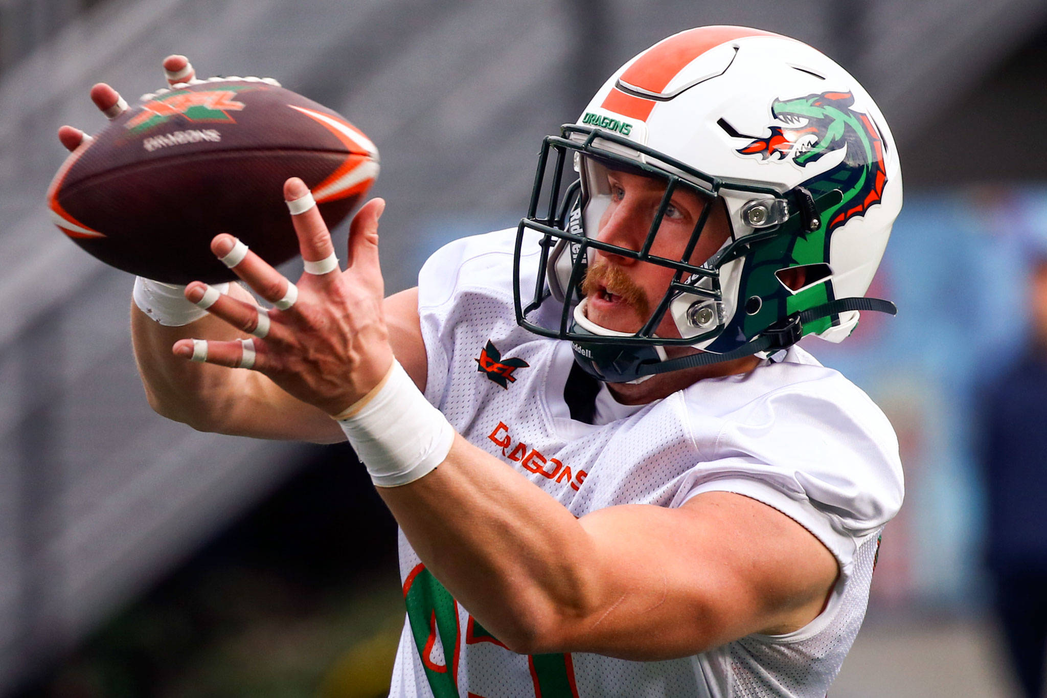 The Seattle Dragons’ Connor Hamlett, a graduate of Meadowdale High School, catches a pass during practice Thursday morning at Memorial Stadium in Seattle. (Kevin Clark / The Herald)