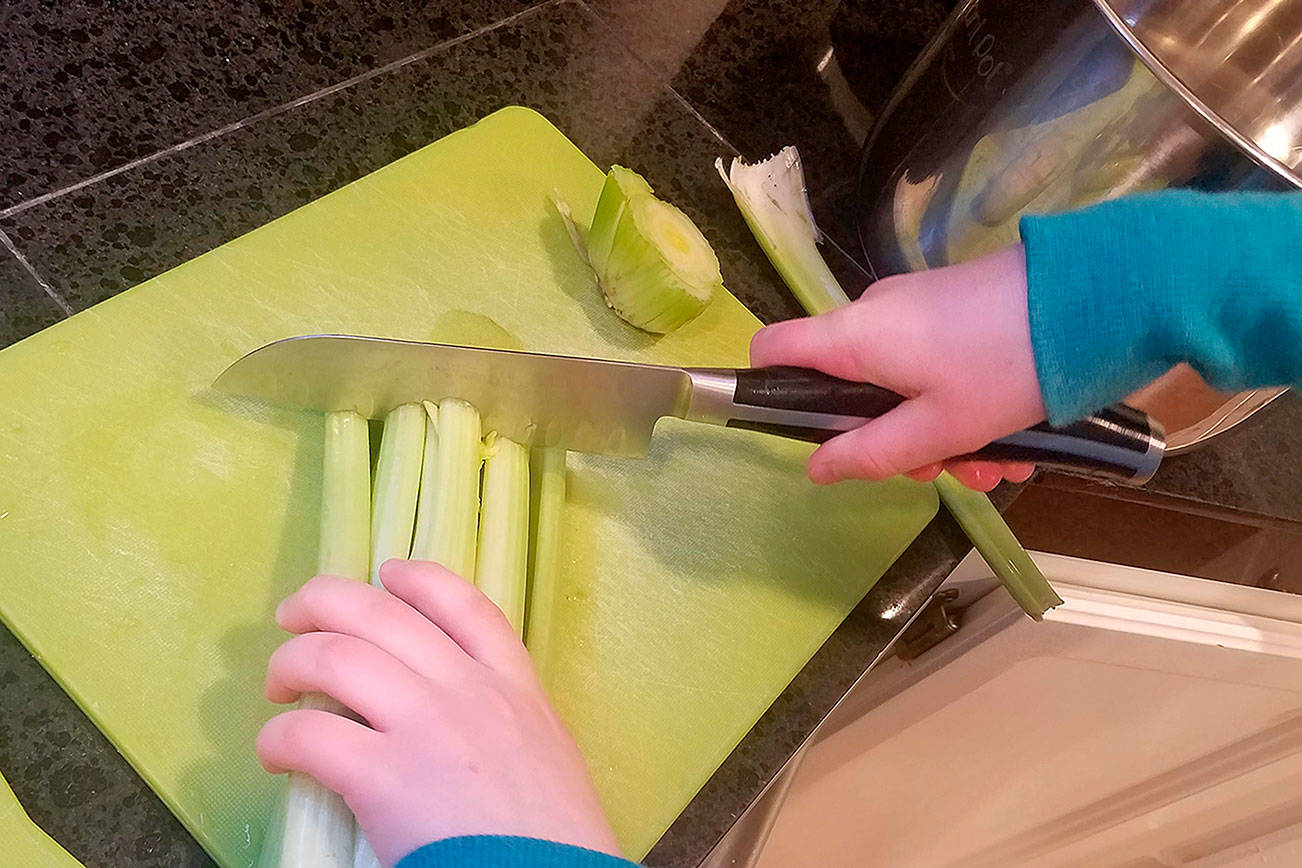 Teaching your children how to cook is scary but rewarding