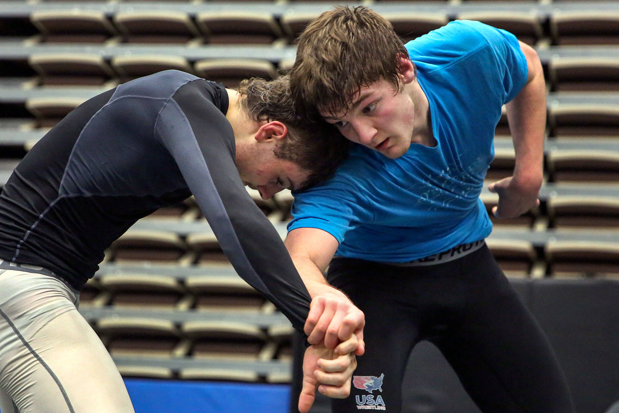 Darrington wrestlers Lucas Reuswaat (left) and Johnny Franke practice Feb. 6 at Darrington High School. (Kevin Clark / The Herald)