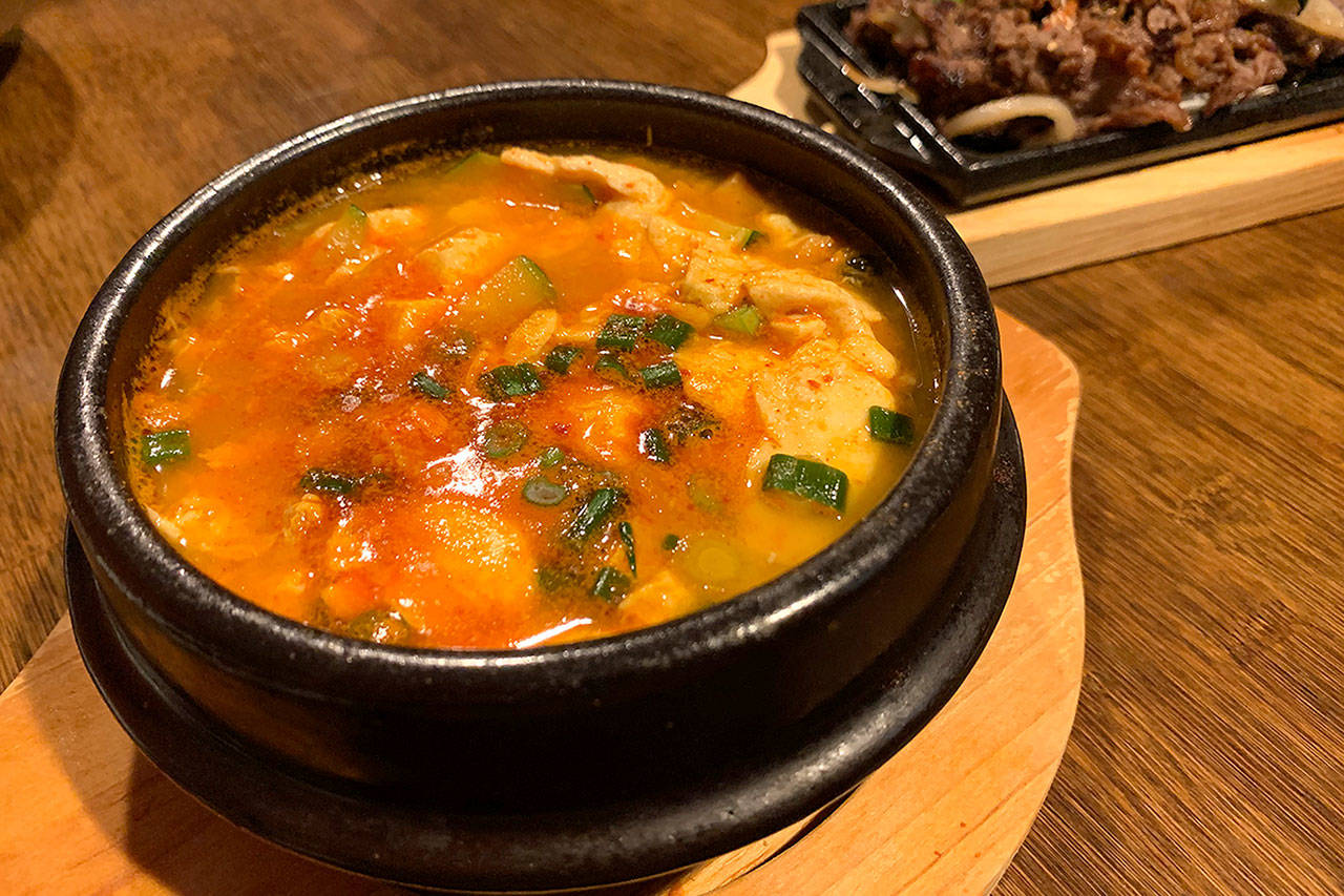 A combo meal with soft tofu stew and bulgogi at Modoo in Lynnwood. (Evan Thompson / The Herald)