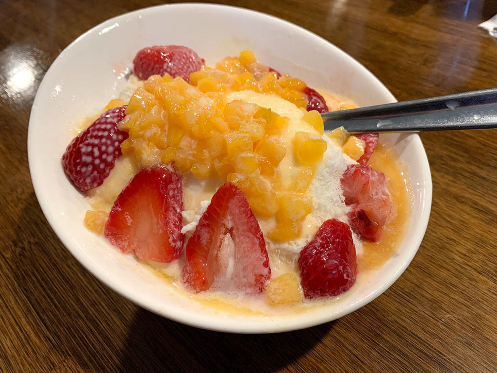 Fruit-topped snowflake shaved ice is a popular Korean dessert. (Evan Thompson / The Herald)
