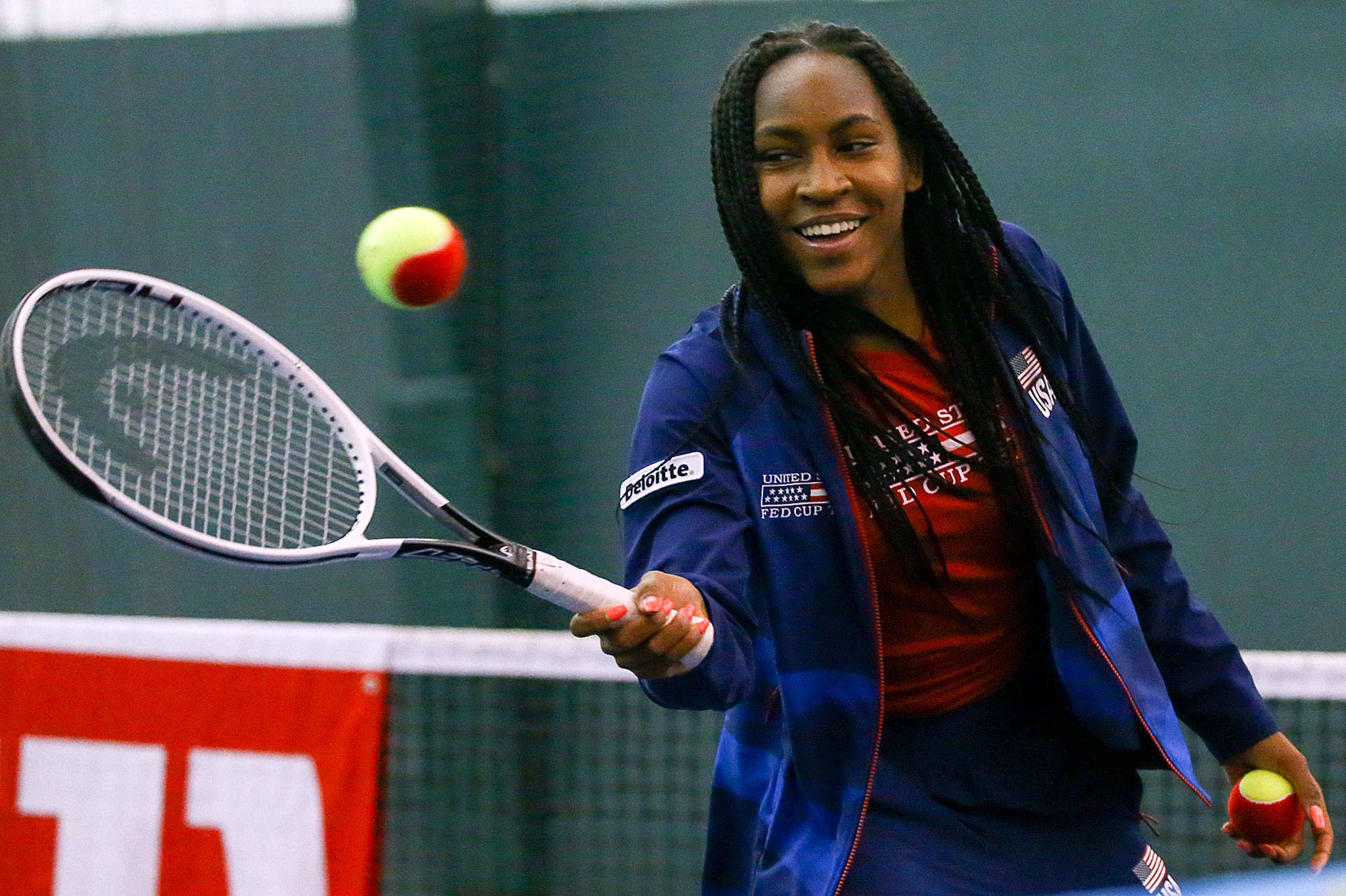 The United States’ Coco Gauff returns a volley during Net Generation Kids’ Day on Tuesday afternoon at Columbia Athletic Club in Everett. (Kevin Clark / The Herald)