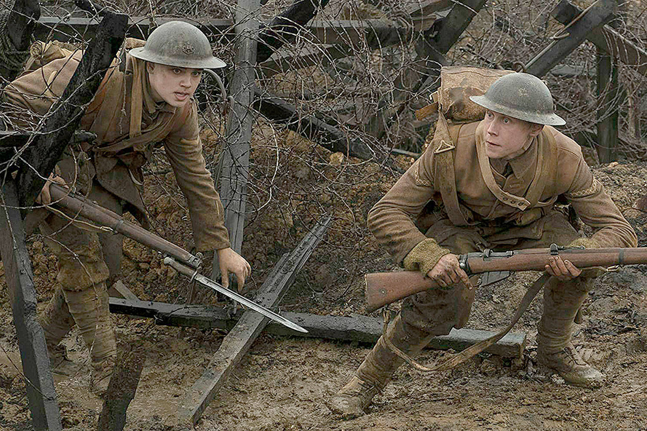 Dean-Charles Chapman and George MacKay in 1917 (Francois Duhamel / Universal Pictures and DreamWorks Pictures/TNS)