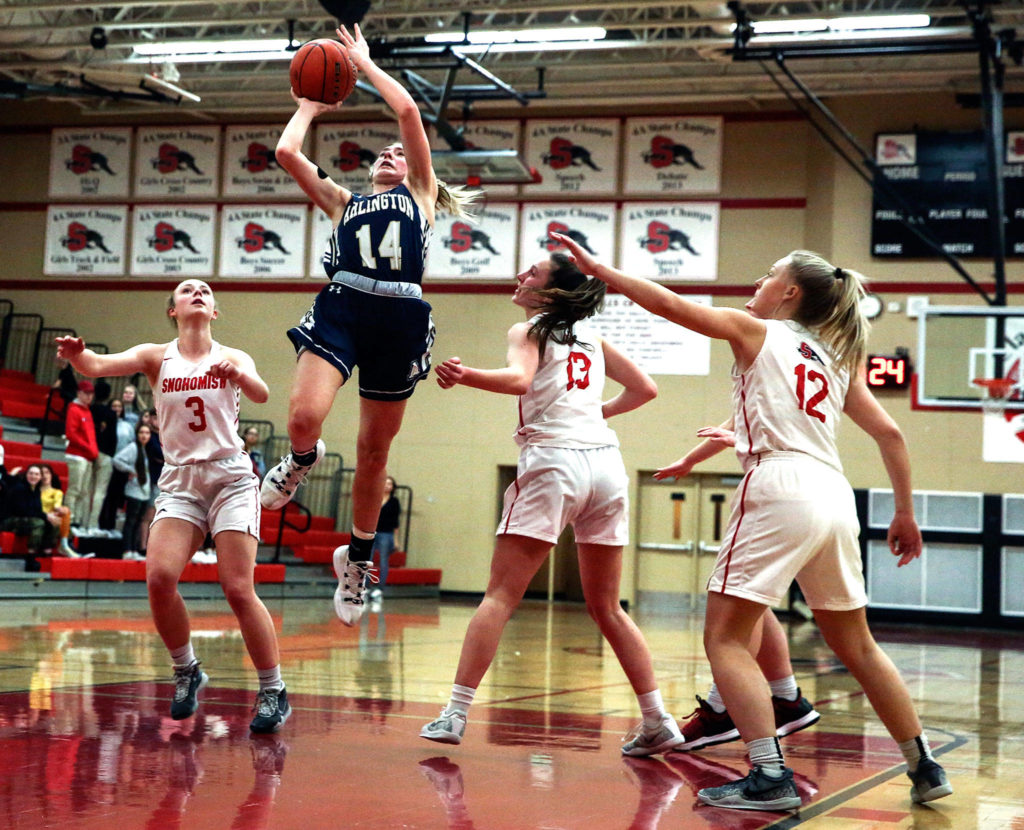 Arlington defeated Snohomish, 46-35, Thursday evening at Snohomish High School in Snohomish on February 6, 2020. (Kevin Clark / The Herald)
