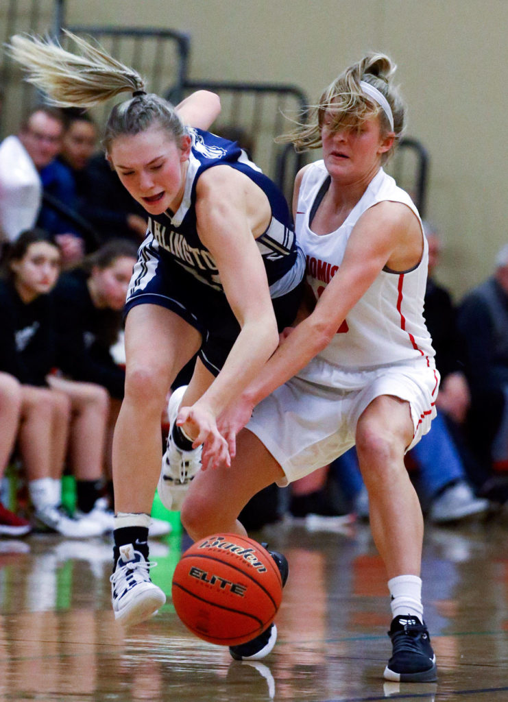 Arlington defeated Snohomish, 46-35, Thursday evening at Snohomish High School in Snohomish on February 6, 2020. (Kevin Clark / The Herald)
