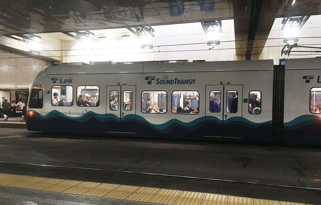 A Sound Transit train arrives at Westlake Station in downtown Seattle in May 2019. (Sue Misao / Herald file)