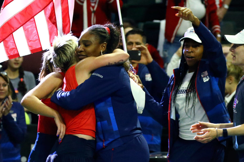 Team USA celebrates the double win to advance in FedCup 2020 Saturday evening at Angel of the Winds Arena in Everett on February 8, 2020. (Kevin Clark / The Herald)
