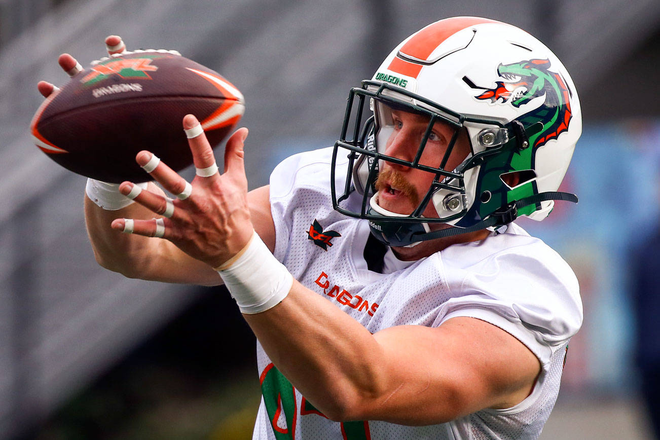 Meadowdale High School graduate Connor Hamlett and the rest of the Seattle Dragons are hoping the XFL proves a hit with the fans. (Kevin Clark / The Herald)