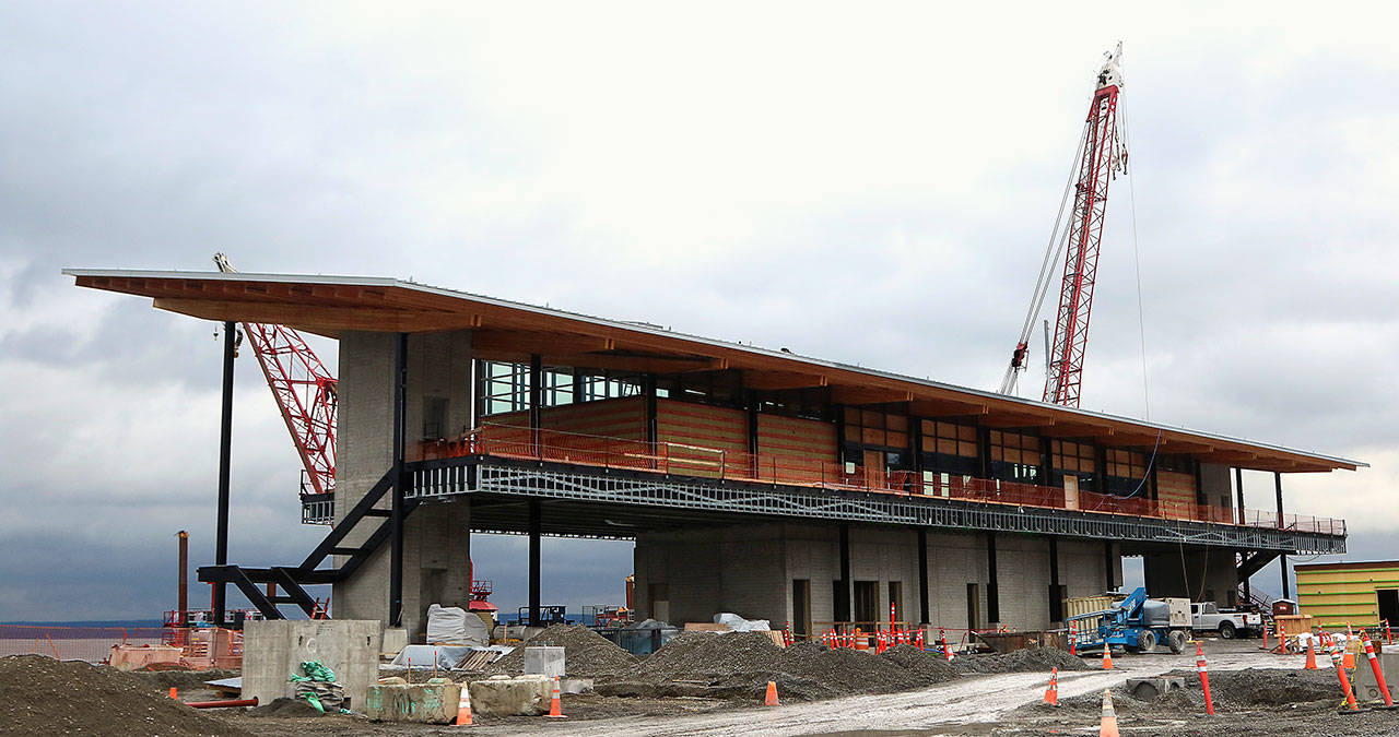 The new Mukilteo passenger ferry terminal, designed to resemble a Native American longhouse, takes shape Thursday. (Dan Bates / The Herald)