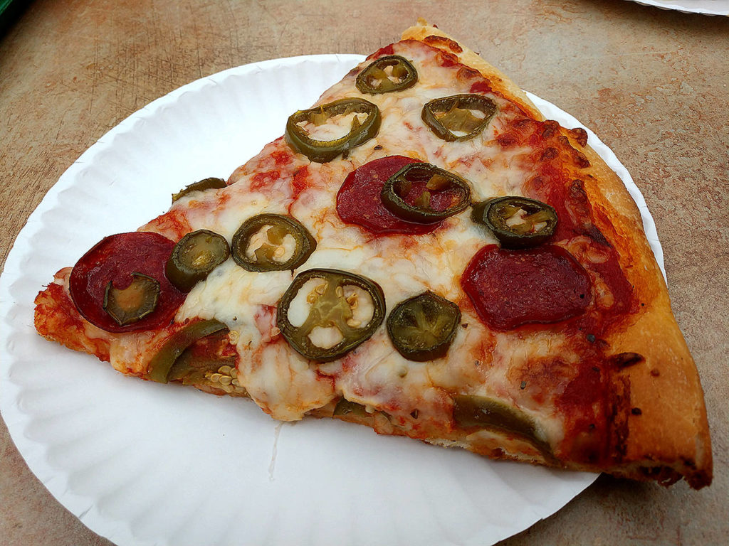 A slice of pepperoni and jalapeno pizza will cost you $4.99 at Mo Pizza. (Sara Bruestle / The Herald)
