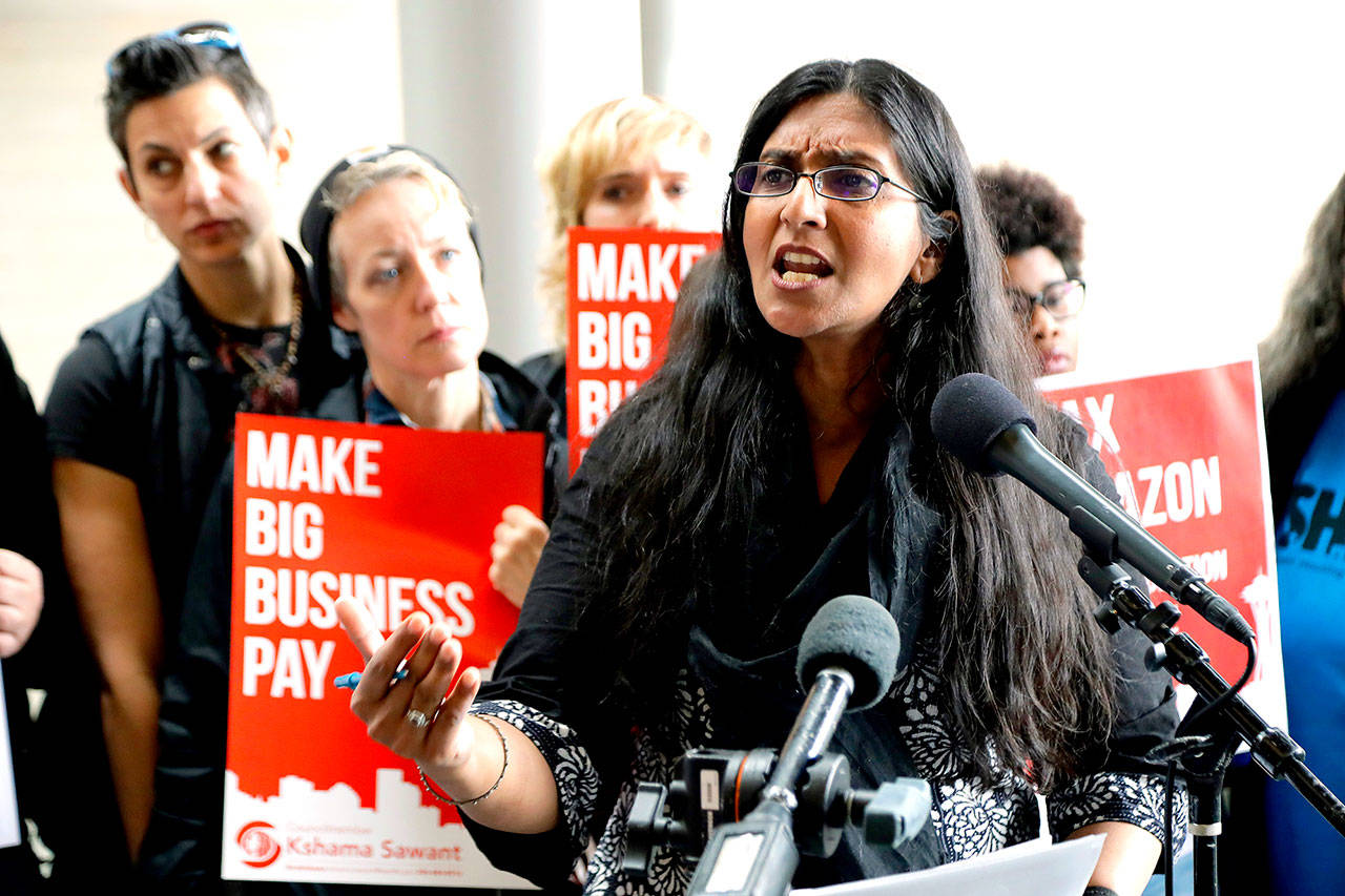 Seattle City Council member Kshama Sawant speaks at City Hall in Seattle last June. (AP Photo/Ted S. Warren, File)
