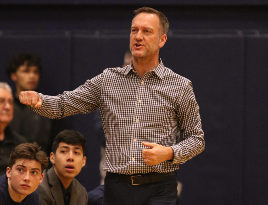 Glacier Peak head coach Brian Hunter looks for a pushing call. Mariner lost to Glacier Peak 90-87 in double overtime in a boys’ basketball game on Tuesday, Feb. 11, 2020 in Everett, Wash. (Andy Bronson / The Herald)
