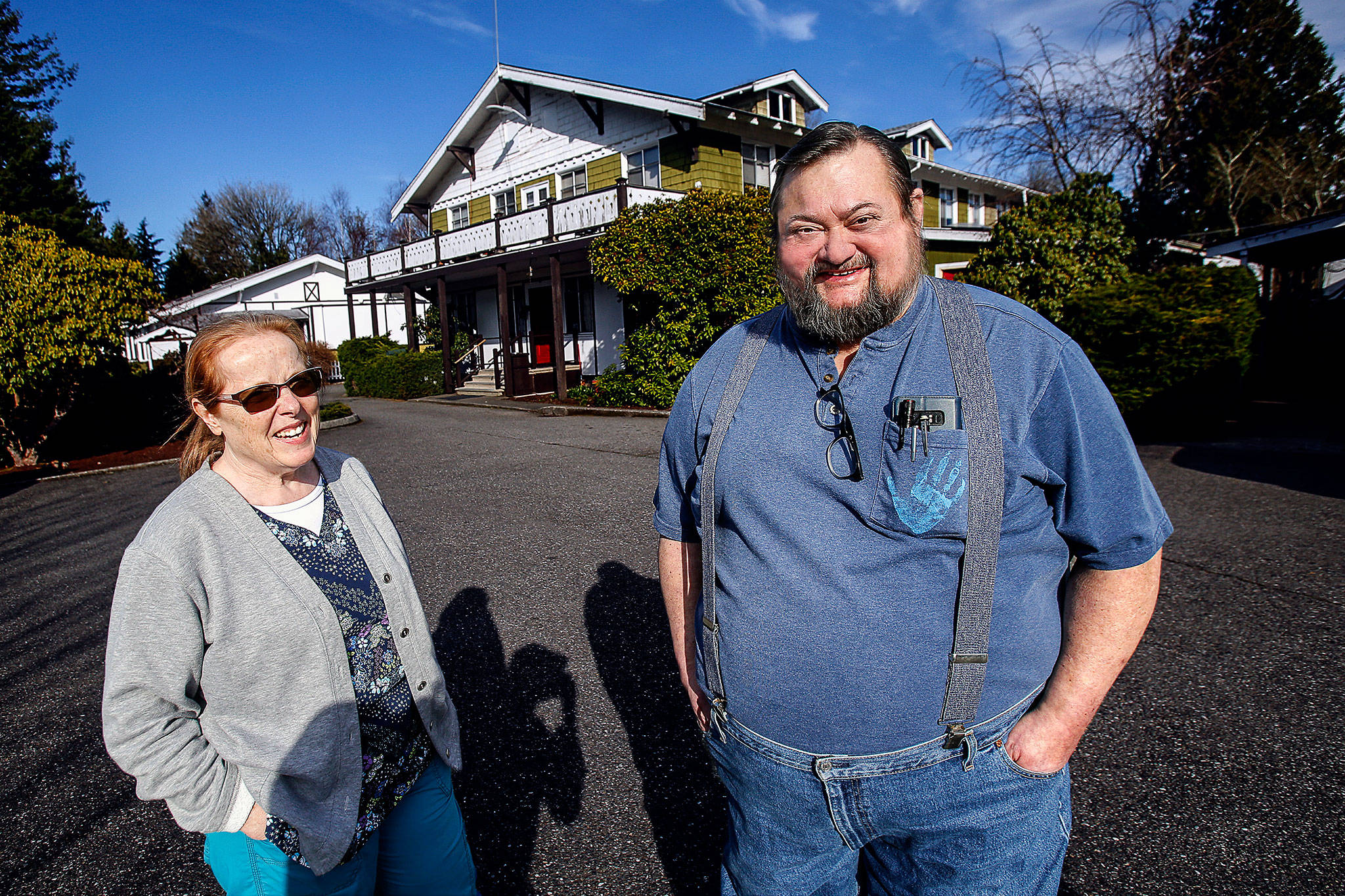 Photos by Dan Bates / The Herald                                Chris Walsh and his wife, Carol, talk outside the Delta Rehabilitation Center about their plans to close the care facility long known as the Snohomish Chalet. Chris is the owner and administrator of the nursing home that cares for people with severe brain injuries. Carol has worked as a nurse there for many years.