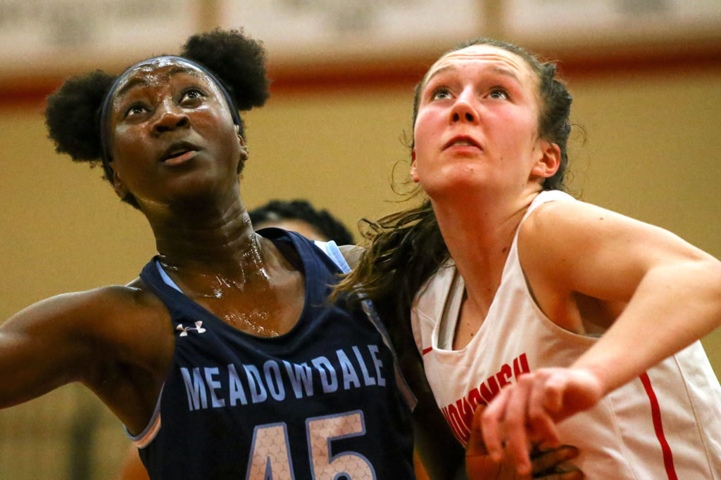 The Snohomish Panthers defeated the Meadowdale Mavericks, 57-39, in a 3A Northwest District Tournament game Friday night at Snohomish High School. (Kevin Clark / The Herald)
