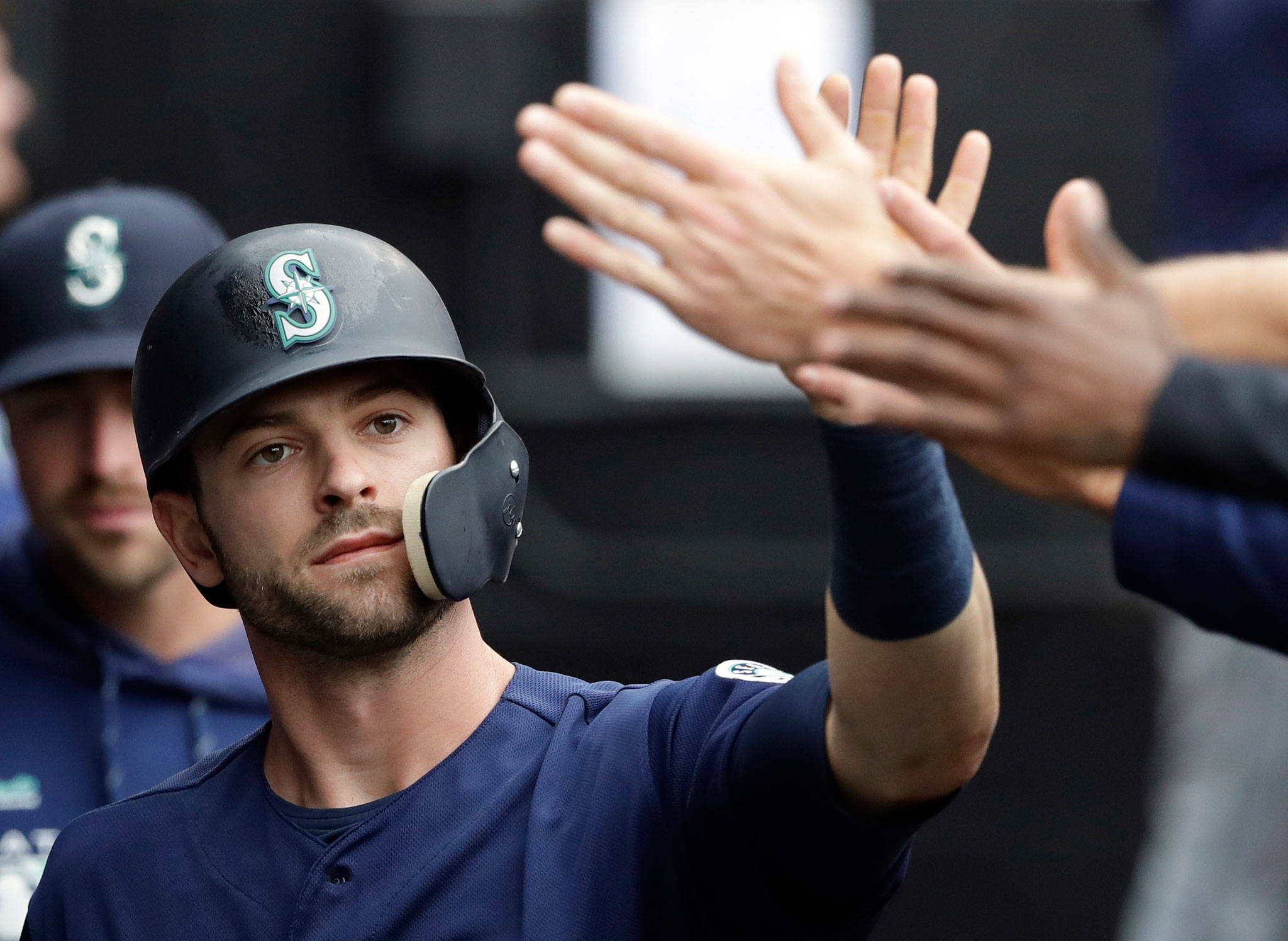 The Mariners’ Mitch Haniger will be out indefinitely after undergoing surgery on his back Thursday, the latest in a string of setbacks for the former All-Star outfielder. (AP Photo/Nam Y. Huh)