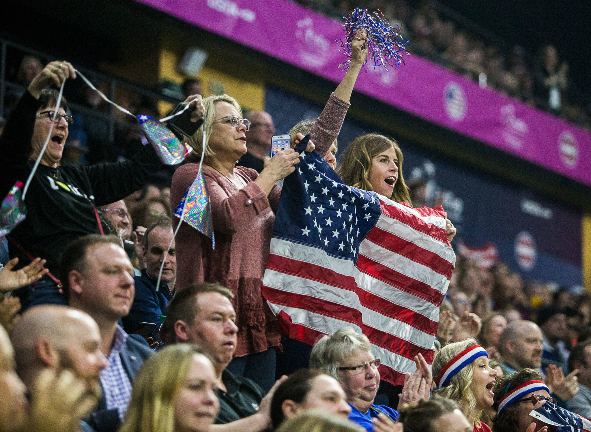 Fans at Angel of the Winds Arena cheer for American tennis player Sofia Kenin during a Fed Cup qualifier against Latvia on Feb. 7 in Everett. The event attracted back-to-back sellout crowds of over 6,300 fans. (Olivia Vanni / The Herald)