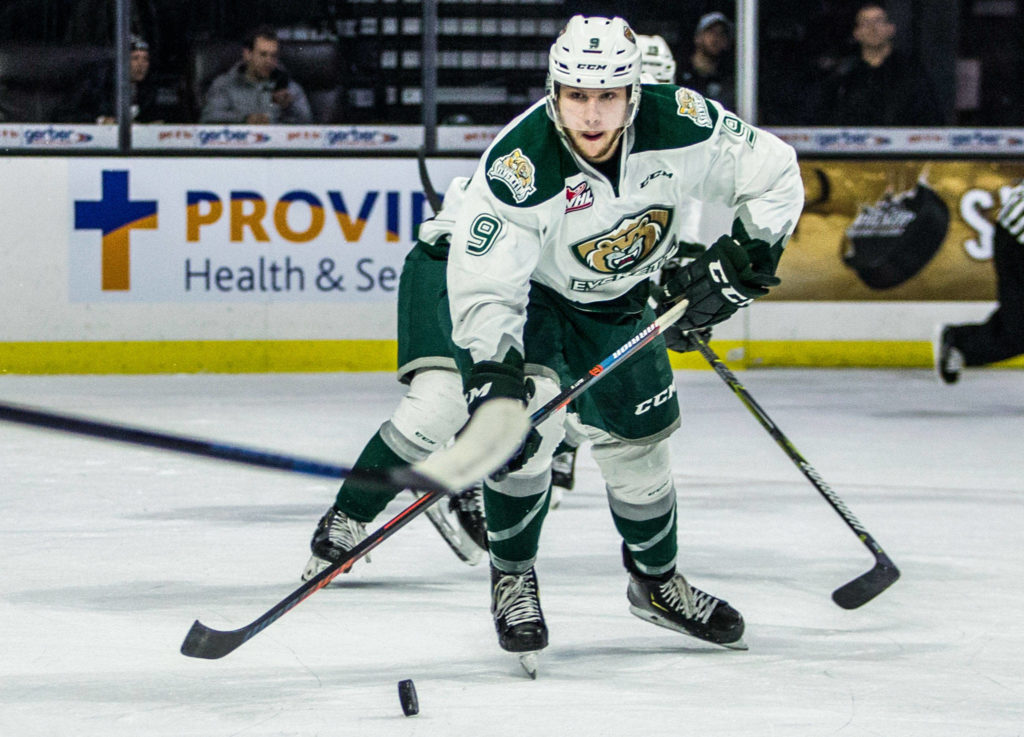 Everetts Dawson Butt skates with the puck during a Jan. 6, 2019 game at Angel of the Winds Arena in Everett. (Olivia Vanni / The Herald)
