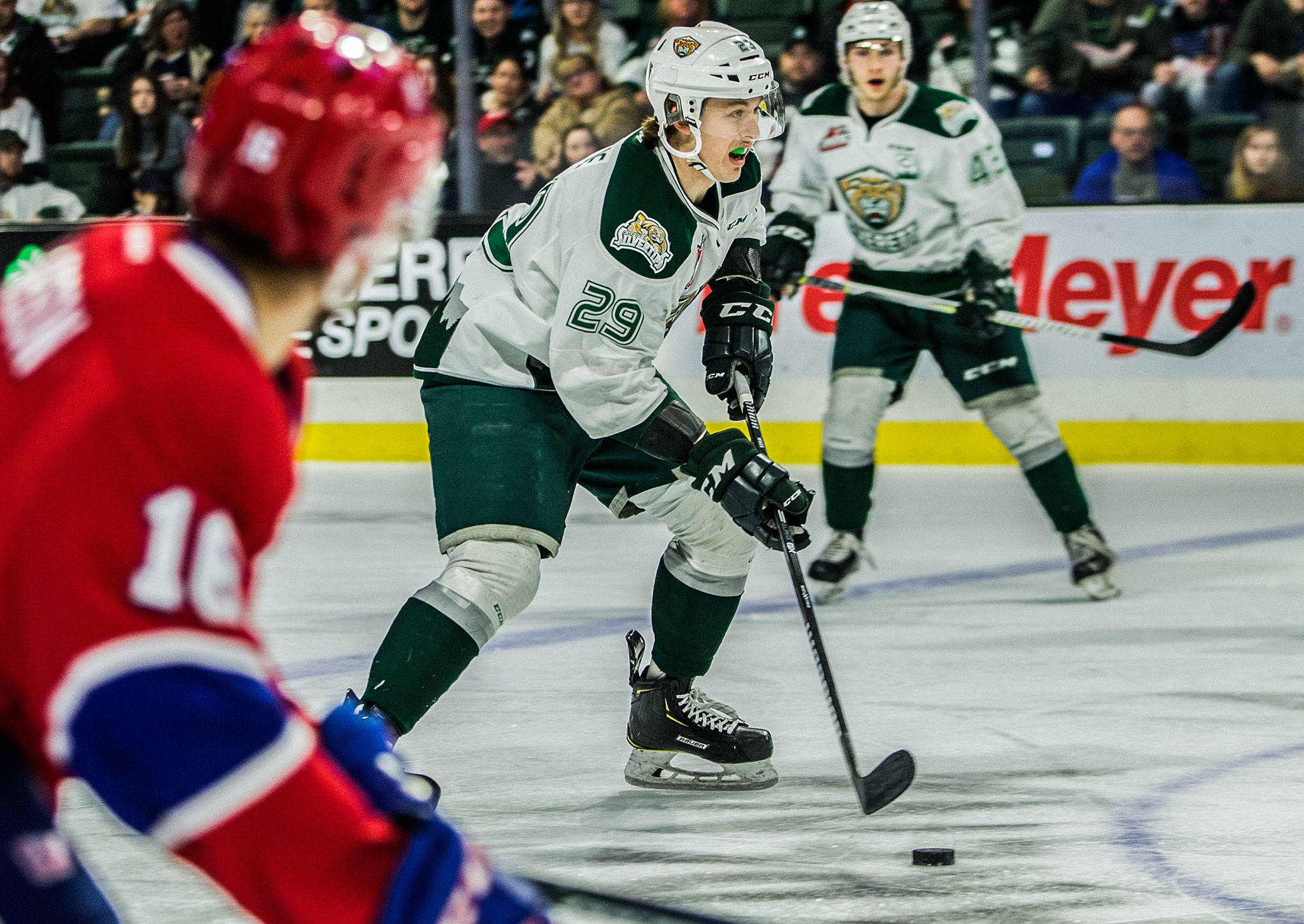 Everetts Wyatte Wylie, a Snohomish County native skates with the puck during a game against Spokane on April 7, 2019 in Everett. (Olivia Vanni / The Herald)