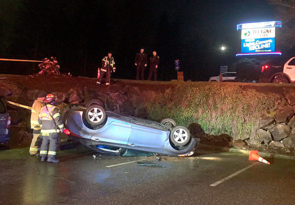 A car ended up on its top in a parking lot Saturday night after hitting something in the 3500 block of 184th Street SW. The driver was treated for unknown injuries at a hospital and arrested for investigation of DUI and hit and run. (Lynnwood Police Department) 20200215
