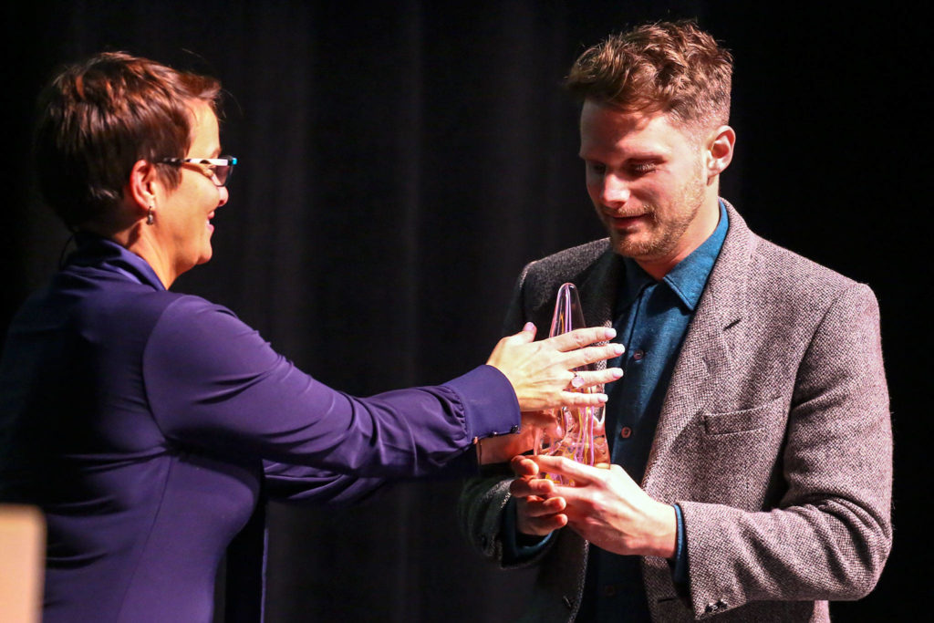 Cassie Franklin presents Richard Porter with his award during The Wendts & Mayor’s Arts Awards Thursday evening the Everett Performing Arts Center in Everett on Feb. 13. (Kevin Clark / The Herald)
