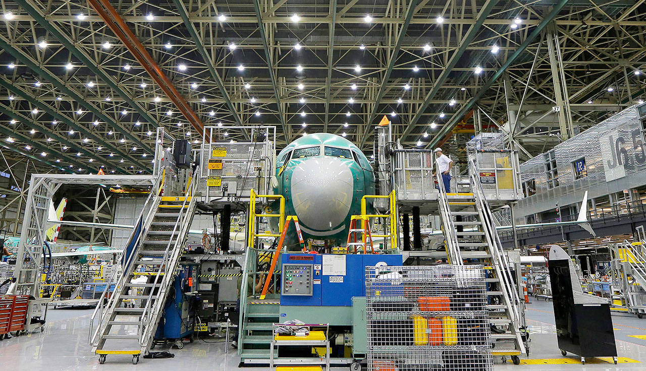 In this 2015 photo, a Boeing 737 Max airplane being built is shown on the assembly line in Renton. (AP Photo/Ted S. Warren)