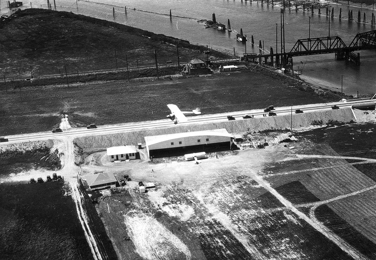Thousands turned out April 22, 1928 for the grand opening of Snohomish County’s first airport. The facility sat on the north side of what is today Smith Island, off Highway 529 between Everett and Marysville. (Everett Public Library)
