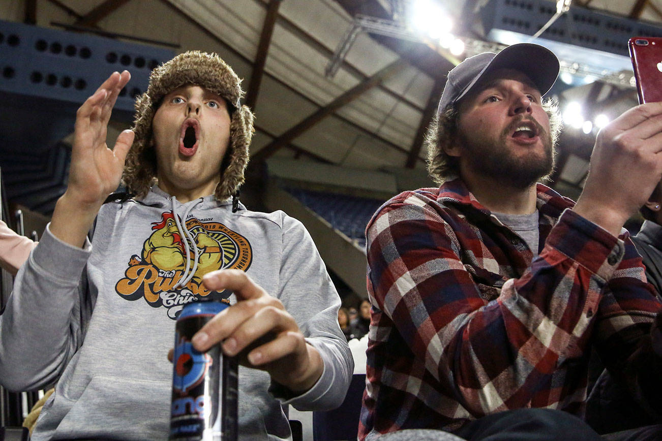 High school wrestler steps in after twin faces fight of his life