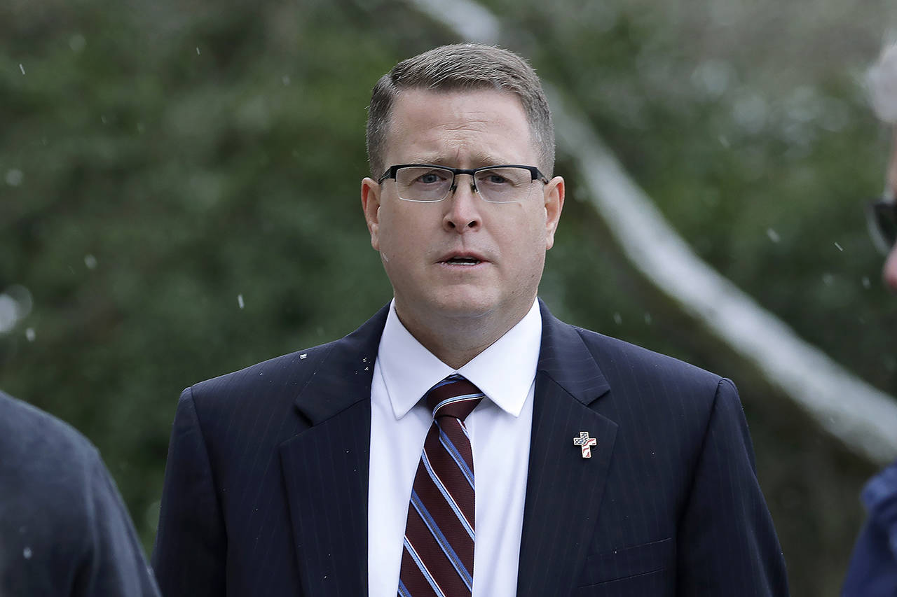 This Jan. 15 photo shows Rep. Matt Shea, R-Spokane Valley, during a rally held by “My Family My Choice,” an organization opposed to government regulations affecting schools and child-raising the Capitol in Olympia. (AP Photo/Ted S. Warren, File)