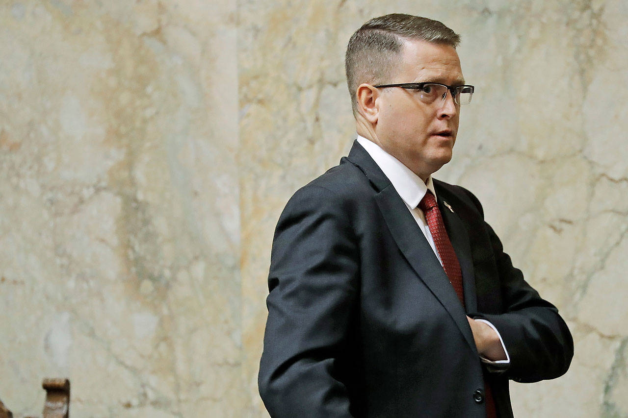 Rep. Matt Shea leaves the House floor Jan. 13, following the first day of the 2020 session of the Washington legislature at the Capitol in Olympia. (AP Photo/Ted S. Warren, file)