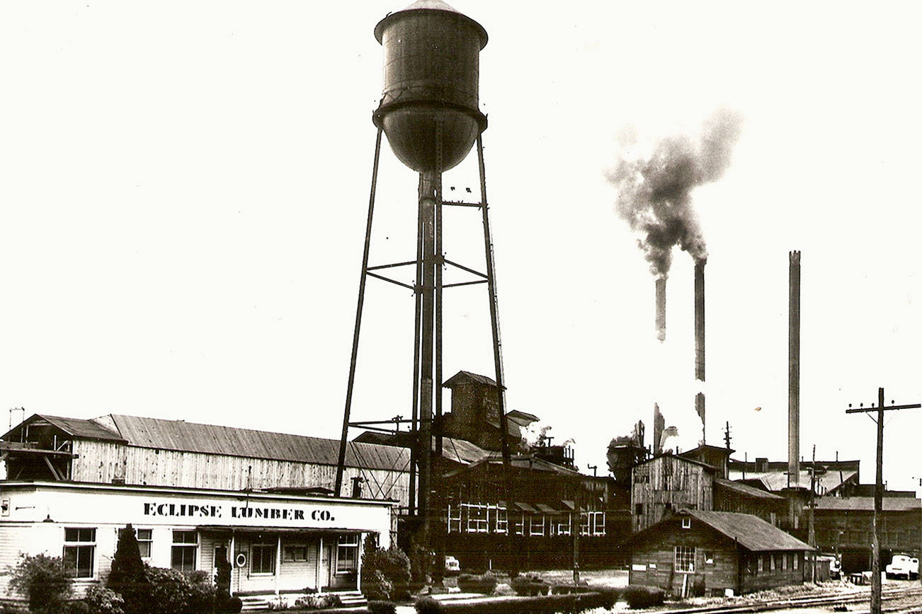 The Eclipse Lumber Company along the Snohomish River in Everett burned down May 7, 1962. Now the site is near the Towns at Riverfront, a development of nearly 200 townhouses. (Historic Everett photo)