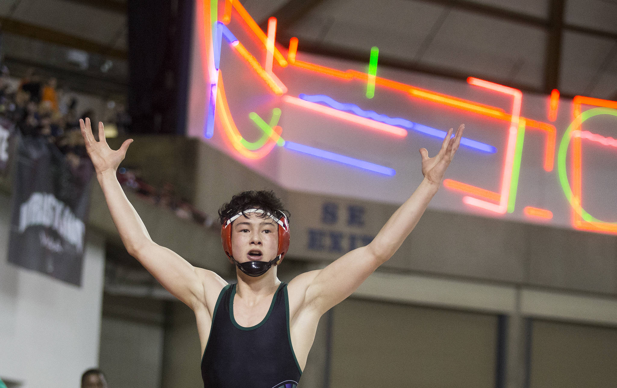 Edmonds-Woodway’s Alex Rapelje celebrates after winning the 3A 138-pound title at Mat Classic XXXII on Saturday at the Tacoma Dome. (Andy Bronson / The Herald)